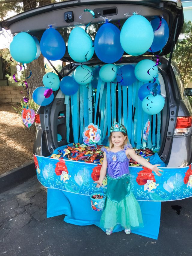 Little girl with a Little Mermaid trunk or treat theme 